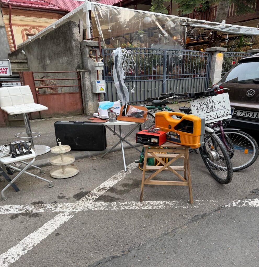 A bicycle and chair on a street AI-generated content may be incorrect.