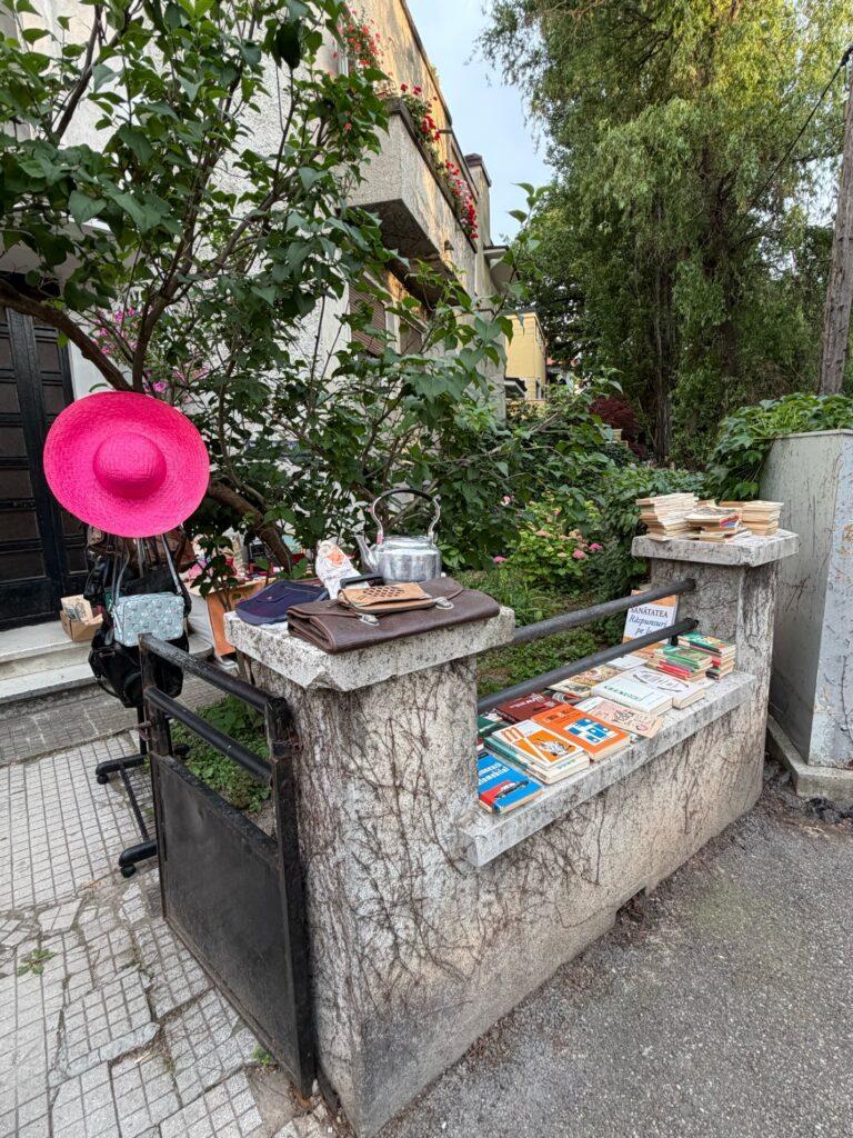A table with books on it AI-generated content may be incorrect.