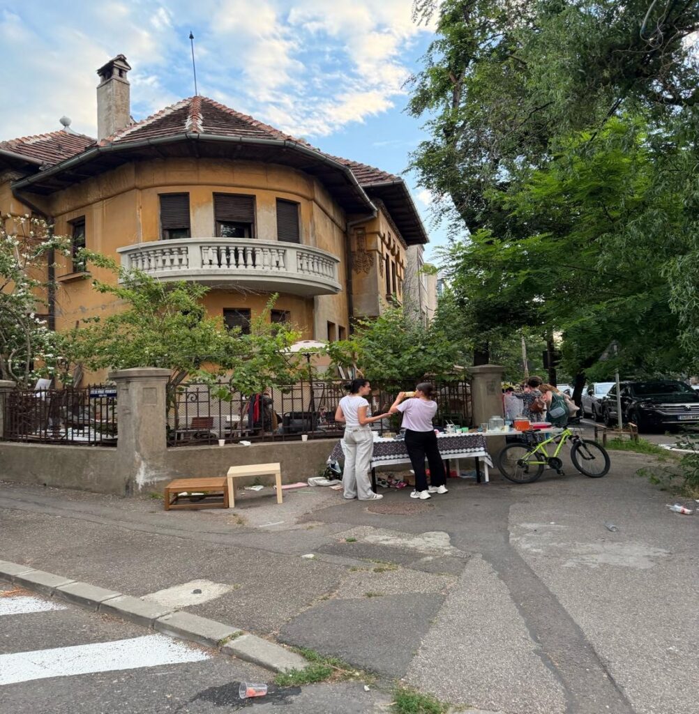 People outside a building AI-generated content may be incorrect.
